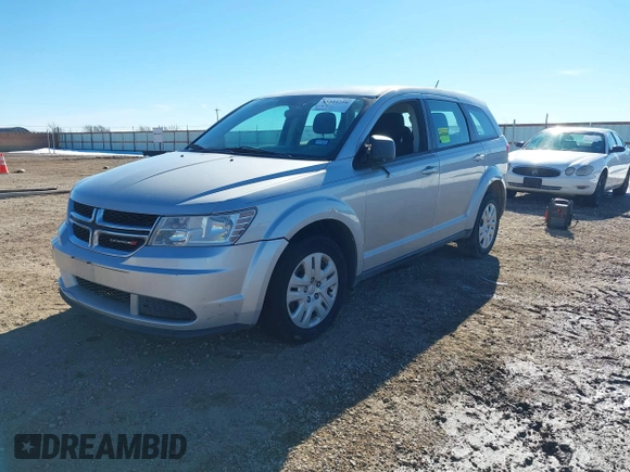 2014 Dodge Journey American Value Pkg with VIN 3C4PDCAB5ET119192, listed as a IAAI auction lot 41344250 with 228,461 mi miles. Bid and sale history available at carsss.com. Image 2.