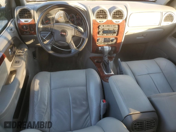 2007 GMC Envoy SLT with VIN 1GKDT13SX72259545, listed as a Copart auction lot 75602384 with 79,055 mi miles and Salvage Title. Bid and sale history available at DreamBid. Image 8.