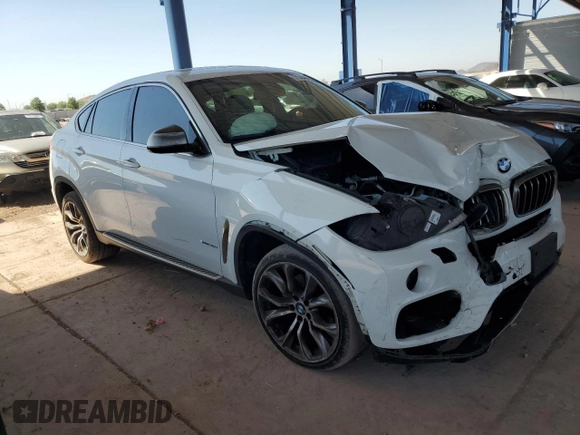 2016 BMW X6 sDrive35i with VIN 5UXKU0C59G0F93163, listed as a Copart auction lot 74148464 with 110,811 mi miles and Salvage Title. Bid and sale history available at carsss.com. Image 4.