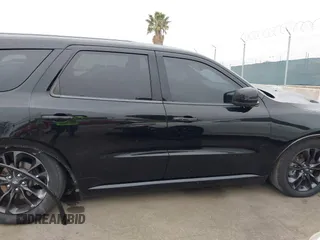 2021 Dodge Durango R/T with VIN 1C4SDHCT5MC660105, listed as a IAAI auction lot 42373172 with 75,227 mi miles and . Bid and sale history available at DreamBid. Image 13.