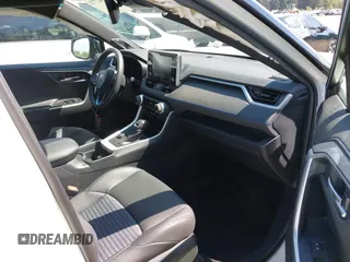 2021 Toyota RAV4 Hybrid XSE with VIN 4T3E6RFV9MU040817, listed as a IAAI auction lot 42182773 with 39,438 mi miles and . Bid and sale history available at DreamBid. Image 5.