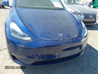 2024 Tesla Model Y Long Range with VIN 7SAYGDEE5RA329172, listed as a IAAI auction lot 41892147 with 8,030 mi miles and . Bid and sale history available at DreamBid. Image 12.