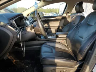 2019 Ford Fusion Hybrid Titanium with VIN 3FA6P0RU9KR116785, listed as a Copart auction lot 68052202 with 89,486 mi miles. Bid and sale history available at carsss.com. Image 7.