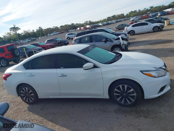 2018 Nissan Altima 2.5 SV with VIN 1N4AL3AP7JC235011, listed as a IAAI auction lot 41737494 with 76,330 mi miles. Bid and sale history available at carsss.com. Image 13.