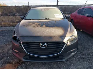 2018 Mazda 3 Touring with VIN 3MZBN1L32JM235162, listed as a IAAI auction lot 41596278 with 144,784 mi miles and . Bid and sale history available at DreamBid. Image 12.