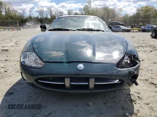 2002 Jaguar XK with VIN SAJDA42C22NA23724, listed as a Copart auction lot 53521005 with 61,468 mi miles and Salvage Title. Bid and sale history available at DreamBid. Image 5.