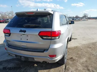 2015 Jeep Grand Cherokee Altitude with VIN 1C4RJFAG3FC210151, listed as a IAAI auction lot 41865151 with 122,579 mi miles. Bid and sale history available at carsss.com. Image 4.