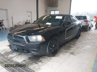 2012 Dodge Charger Police with VIN 2C3CDXAG3CH305132, listed as a IAAI auction lot 41555619 with 128,777 mi miles. Bid and sale history available at carsss.com. Image 2.