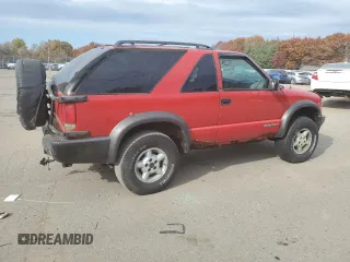 2000 Chevrolet Blazer LS z VIN 1GNCT18W8YK155812, wystawiony jako Copart lot #77315424 z przebiegiem 151 418 mil mil oraz Czysty tytuł • Clean title. Historia ofert i sprzedaży dostępna na DreamBid. Obrazek 3.