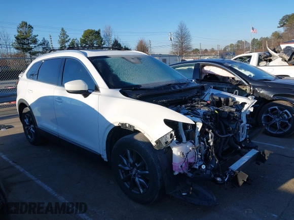 2021 Mazda CX-9 Touring with VIN JM3TCACY4M0522302, listed as a IAAI auction lot 41323543 with 35,223 mi miles and . Bid and sale history available at DreamBid. Image 14.