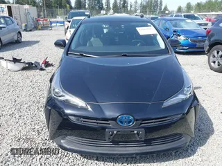 2021 Toyota Prius L Eco with VIN JTDKAMFU8M3136565, listed as a IAAI auction lot 42161896 with 39,634 mi miles and . Bid and sale history available at DreamBid. Image 13.