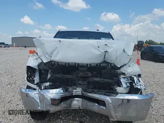 2017 Ram 2500 SLT z VIN 3C6TR5DT2HG651892, wystawiony jako Copart lot #61003895 z przebiegiem 211 057 mil mil oraz Szkoda całkowita • Salvage title. Historia ofert i sprzedaży dostępna na DreamBid. Obrazek 13.