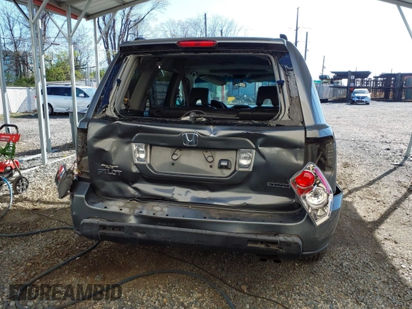 2007 Honda Pilot EX-L with VIN 5FNYF18777B012649, listed as a IAAI auction lot 42070873 with 167,419 mi miles and . Bid and sale history available at DreamBid. Image 16.