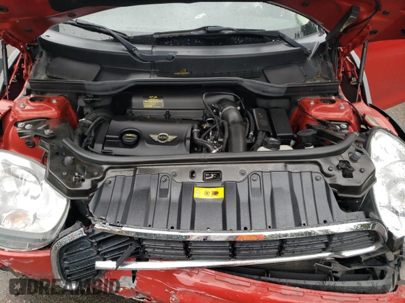 2014 MINI Countryman S with VIN WMWZC3C52EWP25379, listed as a Copart auction lot 61438355 with 76,943 mi miles and Salvage title. Bid and sale history available at DreamBid. Image 12.