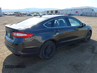 2013 Ford Fusion Titanium with VIN 3FA6P0D92DR216426, listed as a IAAI auction lot 42087273 with 205,805 mi miles. Bid and sale history available at carsss.com. Image 4.
