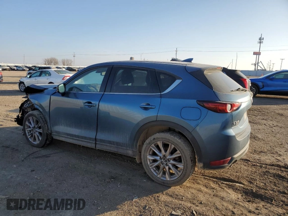 2020 Mazda CX-5 Grand Touring with VIN JM3KFBDM1L0727482, listed as a Copart auction lot 82976114 with 103,707 mi miles and Salvage Title. Bid and sale history available at carsss.com. Image 2.