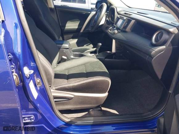 2015 Toyota RAV4 XLE with VIN 2T3WFREV7FW164738, listed as a IAAI auction lot 41950023 with 122,672 mi miles. Bid and sale history available at carsss.com. Image 5.