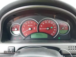 2004 Pontiac GTO z VIN 6G2VX12G84L183838, wystawiony jako IAAI lot #41946144 z przebiegiem 134 718 mil mil oraz . Historia ofert i sprzedaży dostępna na DreamBid. Obrazek 15.
