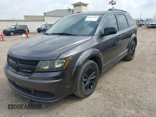 2019 Dodge Journey SE with VIN 3C4PDCBBXKT860142, listed as a IAAI auction lot 42126997 with 101,675 mi miles and . Bid and sale history available at DreamBid. Image 2.