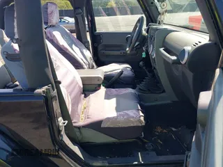 2008 Jeep Wrangler Sahara with VIN 1J4FA54188L541664, listed as a IAAI auction lot 39784204 with 145,145 mi miles and . Bid and sale history available at DreamBid. Image 5.