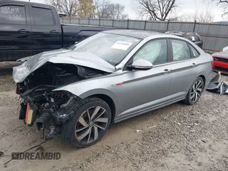 2020 Volkswagen Jetta GLI S z VIN 3VW6T7BU9LM011281, wystawiony jako IAAI lot #41576884 z przebiegiem 66 252 mil mil oraz . Historia ofert i sprzedaży dostępna na DreamBid. Obrazek 18.