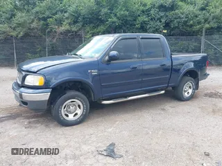 2003 Ford F-150 XLT with VIN 1FTRW08L73KB50541, listed as a IAAI auction lot 42740941 with 181,828 mi miles and . Bid and sale history available at DreamBid. Image 2.