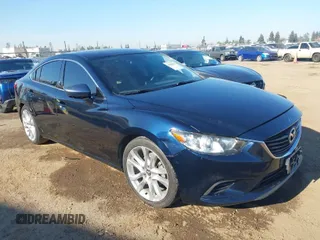 2016 Mazda 6 i Touring with VIN JM1GJ1V58G1457729, listed as a IAAI auction lot 41869941 with 159,914 mi miles and . Bid and sale history available at carsss.com. Image 1.