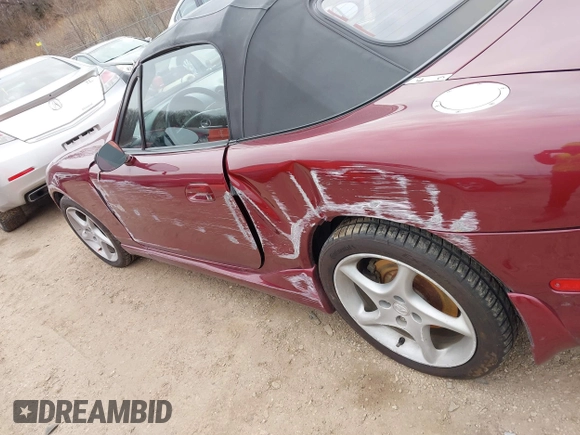 2003 Mazda MX-5 Miata Cloth z VIN JM1NB353X30308589, wystawiony jako IAAI lot #41454795 z przebiegiem 110 940 mil mil oraz . Historia ofert i sprzedaży dostępna na DreamBid. Obrazek 12.