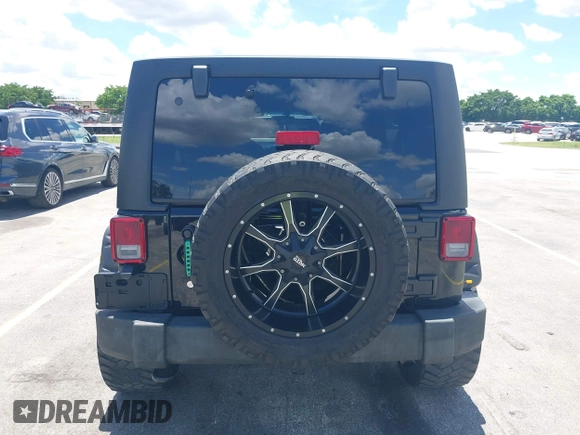 2016 Jeep Wrangler Unlimited Sport z VIN 1C4BJWDG4GL327638, wystawiony jako IAAI lot #42494615 z przebiegiem 139 371 mil mil oraz . Historia ofert i sprzedaży dostępna na DreamBid. Obrazek 16.
