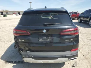 2021 BMW X5 xDrive40i с VIN 5UXCR6C06M9E80968, выставлен на аукционе Copart как лот 54848645 с пробегом 52 033 миль миль и Списание • Salvage title. История ставок и продаж доступна на DreamBid. Изображение 6.