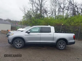2020 Honda Ridgeline RTL-E with VIN 5FPYK3F73LB004365, listed as a IAAI auction lot 41965887 with 80,981 mi miles and . Bid and sale history available at DreamBid. Image 14.