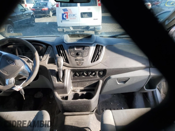 2016 Ford Transit Cargo z VIN 1FTYR2CM8GKA40117, wystawiony jako Copart lot #42287895 z przebiegiem Nie podano mil oraz Szkoda całkowita • Salvage title. Historia ofert i sprzedaży dostępna na DreamBid. Obrazek 8.