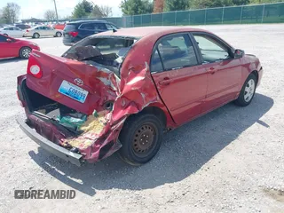 2005 Toyota Corolla CE with VIN 1NXBR32E55Z411298, listed as a IAAI auction lot 42082065 with 220,695 mi miles. Bid and sale history available at carsss.com. Image 4.
