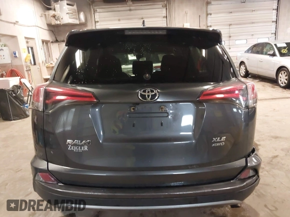 2018 Toyota RAV4 XLE with VIN 2T3RFREVXJW788412, listed as a IAAI auction lot 41931142 with 119,962 mi miles. Bid and sale history available at carsss.com. Image 16.