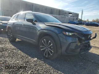 2023 Mazda CX-50 S Premium Plus with VIN 7MMVABEM8PN129773, listed as a Copart auction lot 82489824 with 31,567 mi miles and Salvage Title. Bid and sale history available at DreamBid. Image 4.