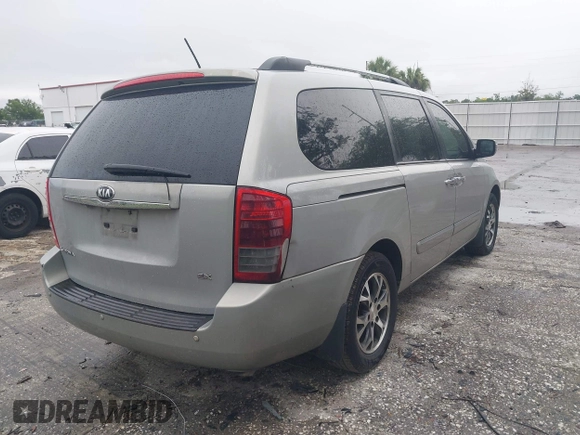 2014 Kia Sedona EX with VIN KNDMH4C74E6578326, listed as a IAAI auction lot 41990311 with 220,772 mi miles. Bid and sale history available at carsss.com. Image 4.