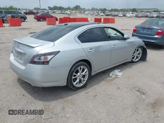 2013 Nissan Maxima SV with VIN 1N4AA5AP6DC802945, listed as a IAAI auction lot 42436193 with 144,462 mi miles and . Bid and sale history available at DreamBid. Image 4.
