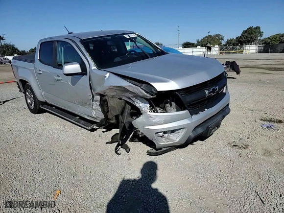 2019 Chevrolet Colorado 4WD Z71 with VIN 1GCGTDENXK1232118, listed as a Copart auction lot 87080994 with 50,306 mi miles and Salvage Title. Bid and sale history available at carsss.com. Image 10.
