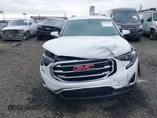 2020 GMC Terrain SLT z VIN 3GKALVEVXLL143417, wystawiony jako IAAI lot #41714662 z przebiegiem 97 634 mil mil oraz . Historia ofert i sprzedaży dostępna na DreamBid. Obrazek 12.