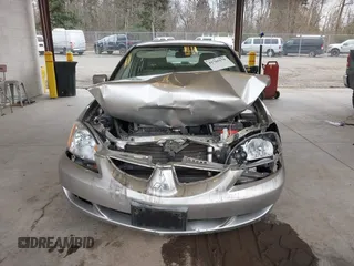 2005 Mitsubishi Lancer ES with VIN JA3AJ26E65U017027, listed as a IAAI auction lot 41765578 with 58,698 mi miles. Bid and sale history available at carsss.com. Image 6.