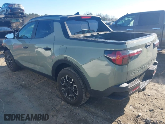 2022 Hyundai Santa Cruz SEL with VIN 5NTJCDAE2NH036992, listed as a IAAI auction lot 41335058 with 43,152 mi miles and . Bid and sale history available at DreamBid. Image 3.