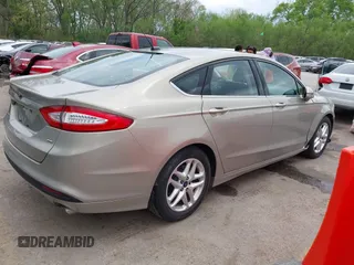 2015 Ford Fusion SE z VIN 3FA6P0H74FR127436, wystawiony jako IAAI lot #42040853 z przebiegiem 164 170 mil mil oraz . Historia ofert i sprzedaży dostępna na DreamBid. Obrazek 4.