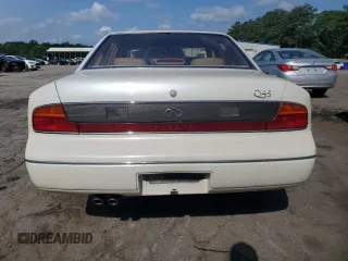 1994 Infiniti Q45 z VIN JNKNG01D3RM252218, wystawiony jako Copart lot #55309475 z przebiegiem 69 073 mil mil oraz Czysty tytuł • Clean title. Historia ofert i sprzedaży dostępna na DreamBid. Obrazek 6.
