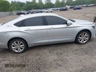 2018 Chevrolet Impala LT with VIN 1G1105S39JU135456, listed as a IAAI auction lot 42360696 with 124,176 mi miles and . Bid and sale history available at DreamBid. Image 12.