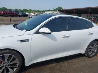 2016 Kia Optima SX Turbo с VIN 5XXGW4L28GG077953, выставлен на аукционе IAAI как лот 42498707 с пробегом 100 000 миль миль и . История ставок и продаж доступна на DreamBid. Изображение 14.
