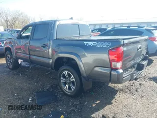 2017 Toyota Tacoma SR5 with VIN 3TMCZ5AN9HM066386, listed as a IAAI auction lot 41991947 with 117,350 mi miles. Bid and sale history available at carsss.com. Image 3.