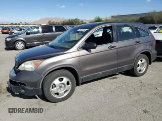 2009 Honda CR-V LX z VIN 5J6RE48349L014469, wystawiony jako Copart lot #55076115 z przebiegiem 128 978 mil mil oraz Szkoda całkowita • Salvage title. Historia ofert i sprzedaży dostępna na DreamBid. Obrazek 1.