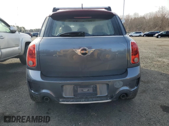 2016 MINI Countryman S z VIN WMWZC5C52GWP49650, wystawiony jako Copart lot #49153185 z przebiegiem 166 695 mil mil oraz Szkody całkowita. Historia ofert i sprzedaży dostępna na DreamBid. Obrazek 6.