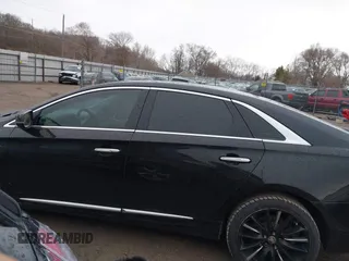 2014 Cadillac XTS Platinum with VIN 2G61W5S84E9291640, listed as a IAAI auction lot 41877867 with 100,462 mi miles and . Bid and sale history available at DreamBid. Image 14.