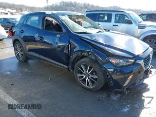 2017 Mazda CX-3 Touring with VIN JM1DKFC75H0157610, listed as a IAAI auction lot 41326591 with 51,291 mi miles. Bid and sale history available at carsss.com. Image 13.